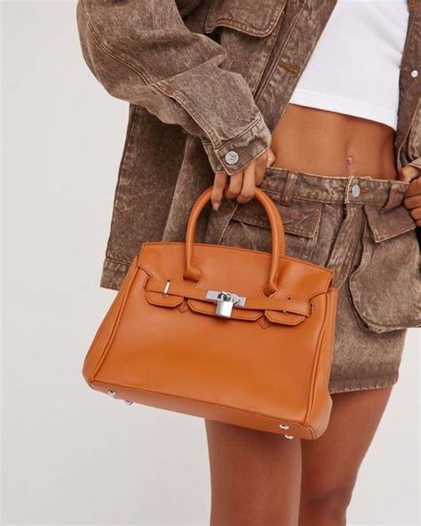 kenny top handle bag dupe|high end purse dupe.